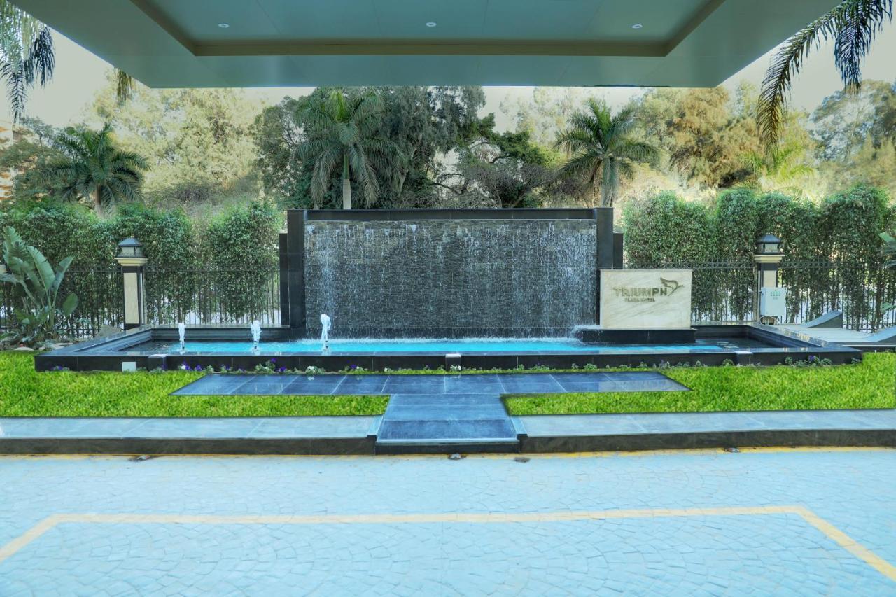 Отель Triumph Plaza